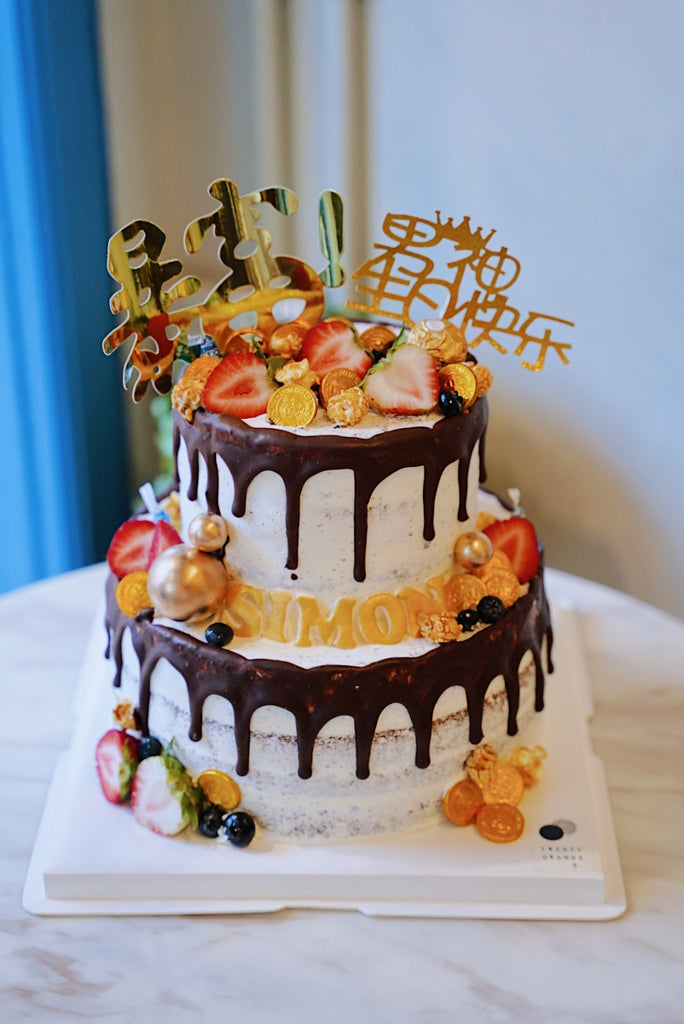 Exploding Wealth Cake (with chocolate drip)